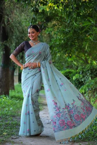 Women's sky blue soft muga cotton floral weaving traditional saree with blouse