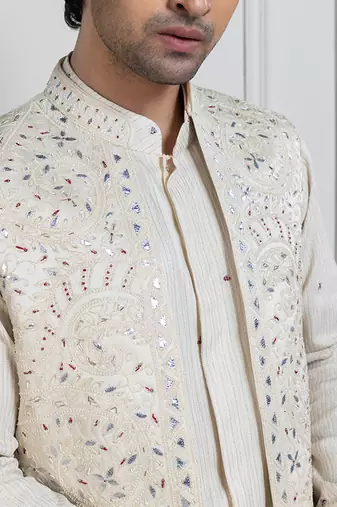 Regal ivory layered kurta set jacket ensemble
