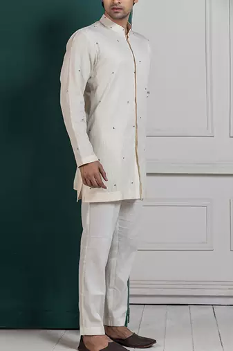 Regal ivory layered kurta set jacket ensemble