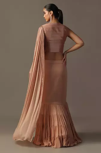 Dusky peach fitted lehenga and top with draped dupatta