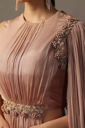 Dusky peach fitted lehenga and top with draped dupatta