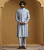 Blue chanderi kurta set with moonga silk nehru jacket set