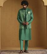 Emerald green chanderi kurta set with tissue nehru jacket set