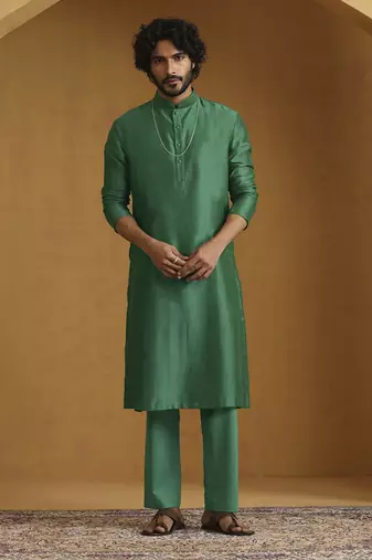 Emerald green chanderi kurta set with tissue nehru jacket set