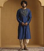 Blue angrakha kurta with tagai detailing and gold satin dhoti