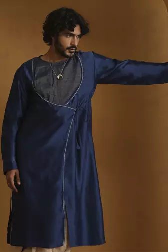 Blue angrakha kurta with tagai detailing and gold satin dhoti