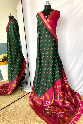 Green art silk ikkat and patola weaving concept saree & contrast blouse
