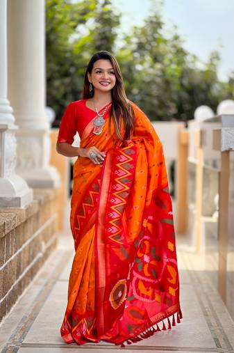 Orange art silk ikkat and patola weaving concept saree with contrast blouse
