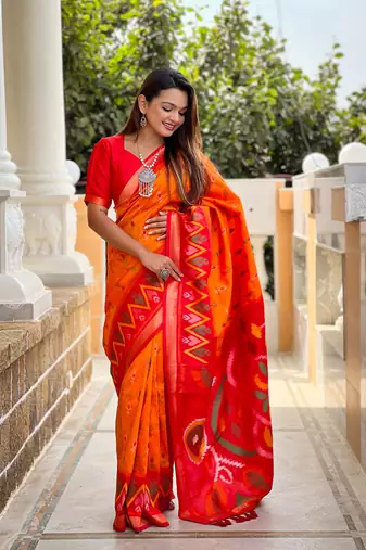 Orange art silk ikkat and patola weaving concept saree with contrast blouse