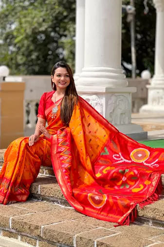 Orange art silk ikkat and patola weaving concept saree with contrast blouse