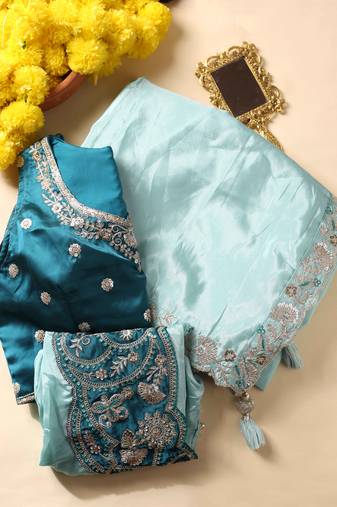 Sky blue saree with designer jacket