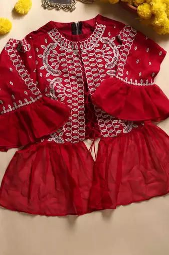 Crimson designer saree with jacket style ready blouse.