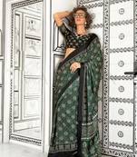 Dark green printed ajarakh satin crepe saree