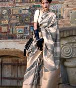 Light beige rangkaat handwoven soft silk saree