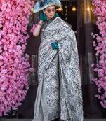 Off-white print japan crepe saree