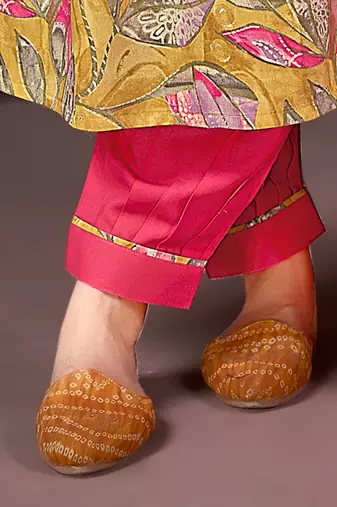 Mustard printed & handwork rayonsalwar kameez alia cut with two pocket stitched