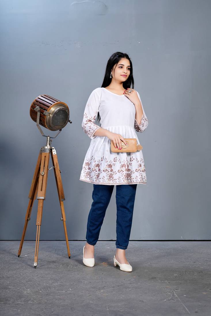 White printed cotton short peplum top.