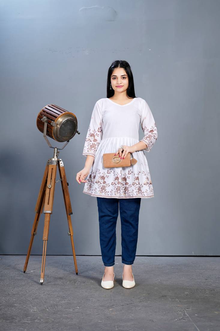 White printed cotton short peplum top.