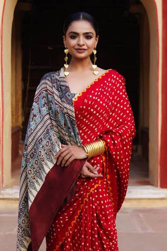 Red pure bandhani silk saree with blouse piece