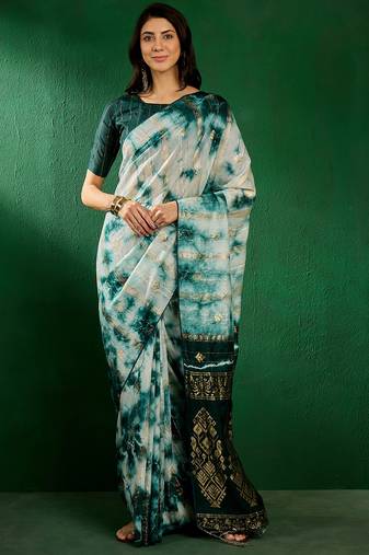 Teal staple cotton saree with tie-dye pattern, golden zari woven