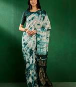 Teal staple cotton saree with tie-dye pattern, golden zari woven