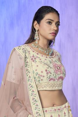 white heavy work lehenga with vibrant blouse and contrast dupatta 4