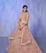 peach heavy work lehenga with vibrant blouse and matching dupatta