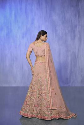 peach heavy work lehenga with vibrant blouse and matching dupatta 3