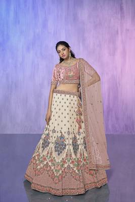 white heavy work lehenga with vibrant blouse and contrast dupatta 1