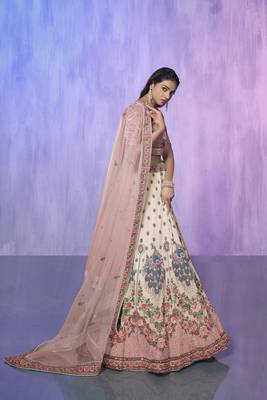 white heavy work lehenga with vibrant blouse and contrast dupatta 2