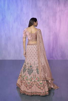 peach heavy work lehenga with vibrant blouse and contrast dupatta 3