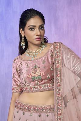 peach heavy work lehenga with vibrant blouse and contrast dupatta 4
