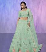 blue heavy work lehenga with vibrant blouse and contrast dupatta