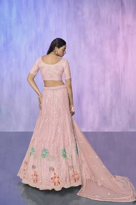 peach heavy work lehenga with vibrant blouse and contrast dupatta 3