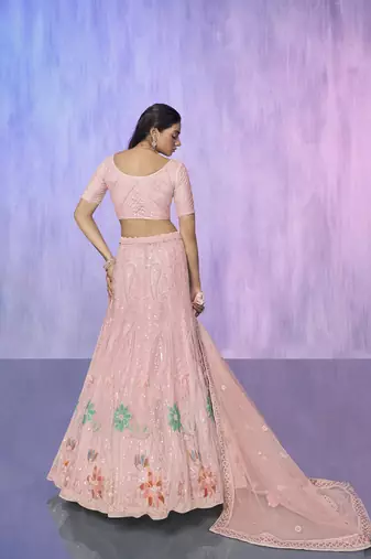 peach heavy work lehenga with vibrant blouse and contrast dupatta