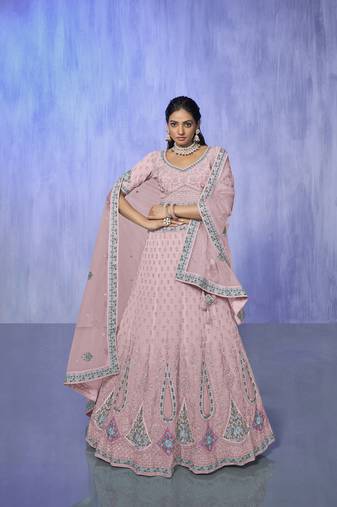 pink heavy work lehenga with vibrant blouse and contrast dupatta