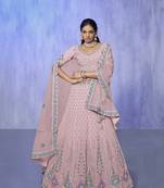 pink heavy work lehenga with vibrant blouse and contrast dupatta