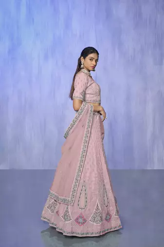 pink heavy work lehenga with vibrant blouse and contrast dupatta