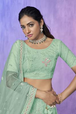 blue heavy work lehenga with vibrant blouse and contrast dupatta 4