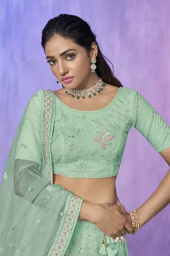 blue heavy work lehenga with vibrant blouse and contrast dupatta