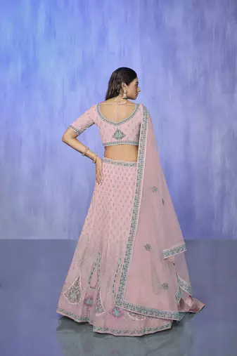pink heavy work lehenga with vibrant blouse and contrast dupatta