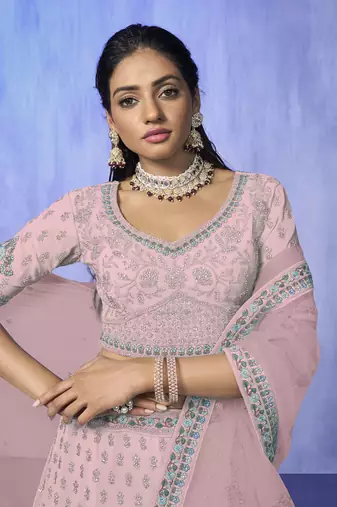 pink heavy work lehenga with vibrant blouse and contrast dupatta