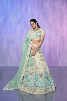 white heavy work lehenga with vibrant blouse and contrast dupatta 1