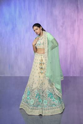 white heavy work lehenga with vibrant blouse and contrast dupatta 2