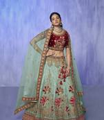 blue heavy work lehenga with vibrant blouse and contrast dupatta