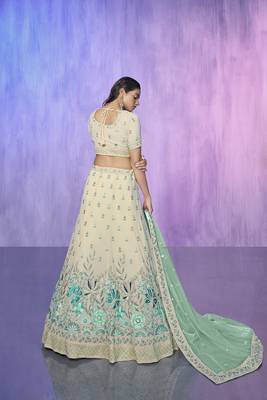 white heavy work lehenga with vibrant blouse and contrast dupatta 3