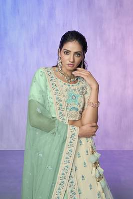 white heavy work lehenga with vibrant blouse and contrast dupatta 4