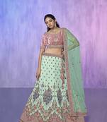 blue heavy work lehenga with vibrant blouse and contrast dupatta