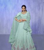blue heavy work lehenga with vibrant blouse and contrast dupatta