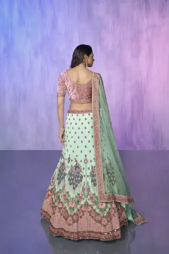 blue heavy work lehenga with vibrant blouse and contrast dupatta